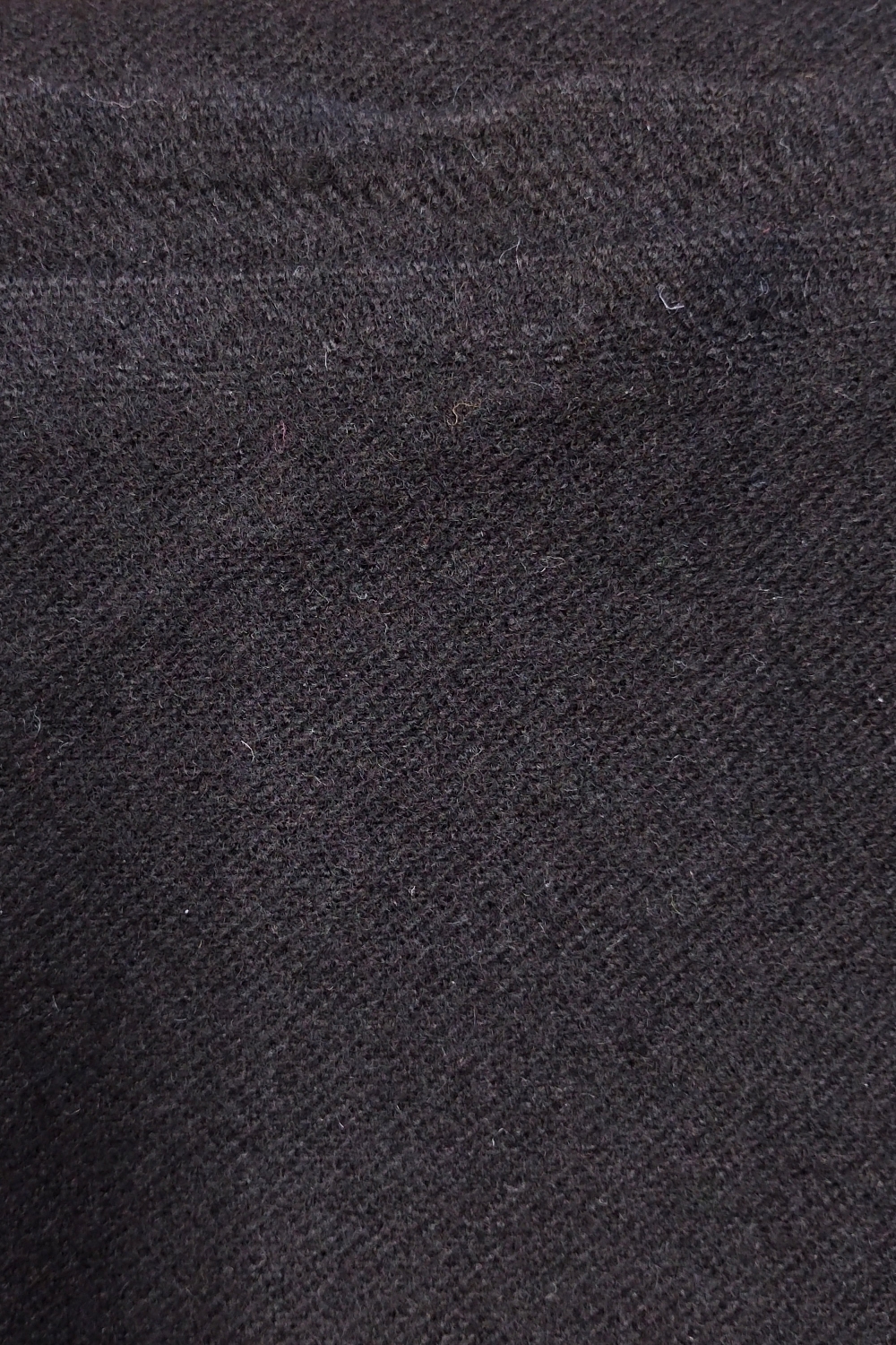 Restebit av lett valket ull, svart, 130 cm